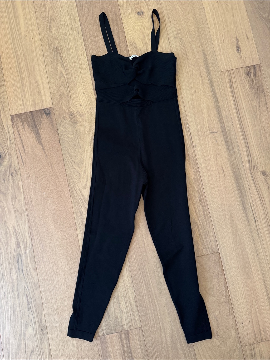 Sleek Black Strap-Front Jumpsuit